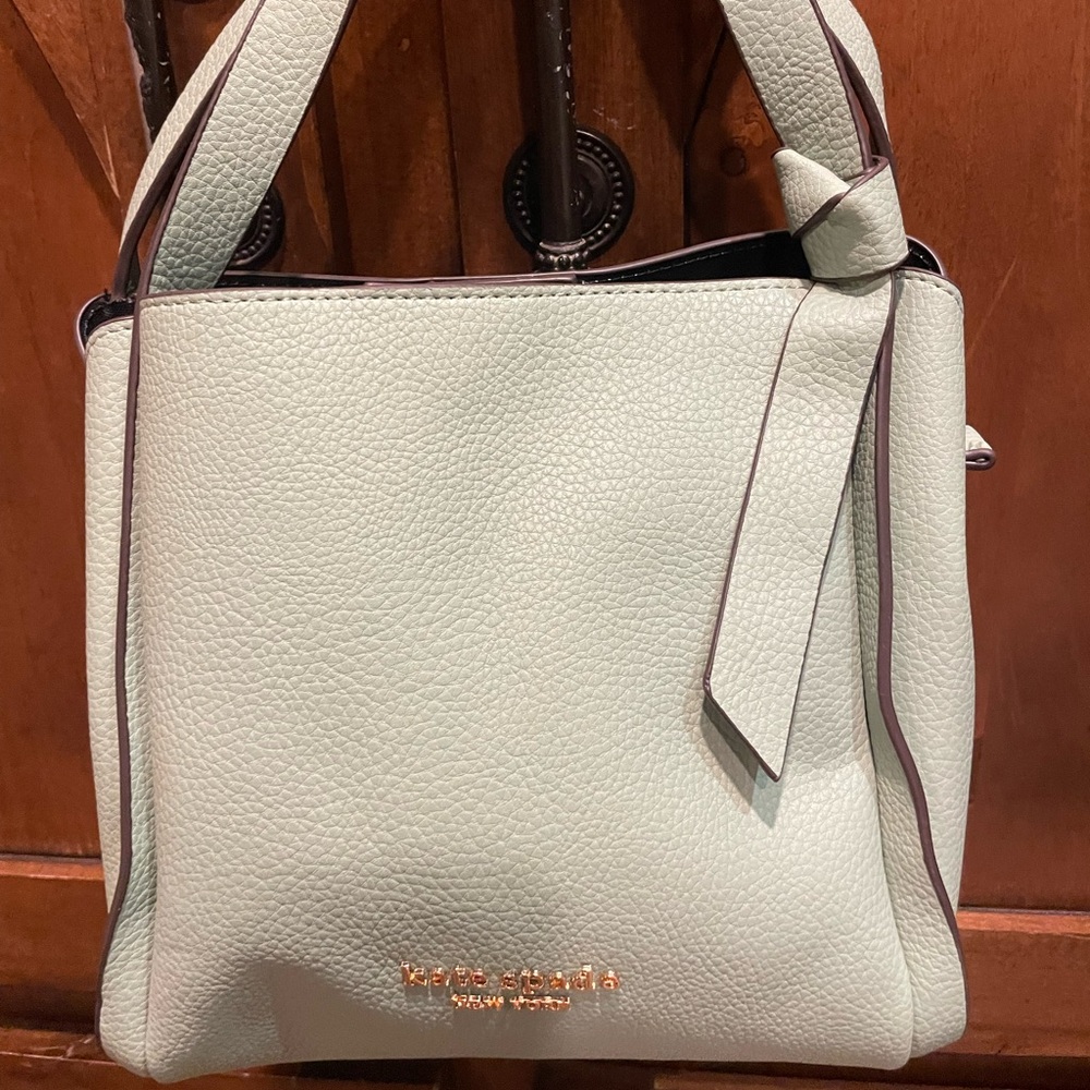 New Kate Spade handbag, Tiffany blue color. Shoulder strap included. Leather.